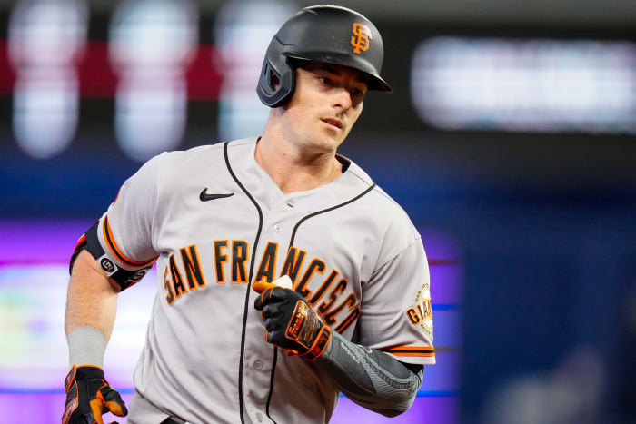 SF Giants center fielder Mike Yastrzemski runs third base after hitting a home run against the Miami Marlins. (2023)